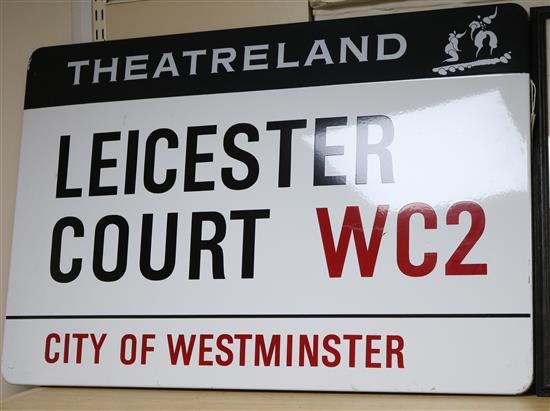 An enamel street sign for Leicester Court WC2 City of Westminster